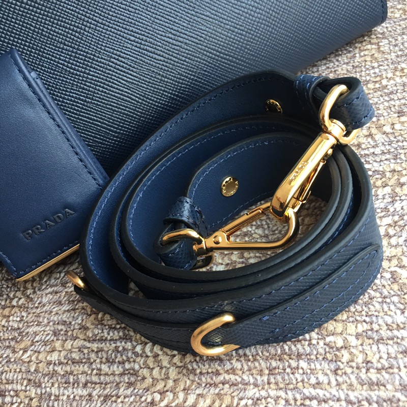 Pra*a top handle bags